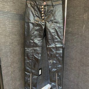 Black wet look trousers with tapered leg